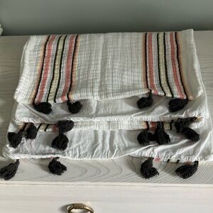 Pair of Roxy x Pottery Barn Teen striped tassel pillow shams